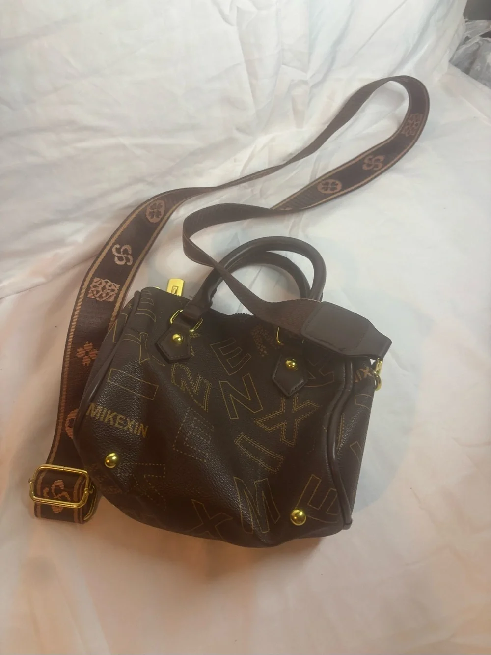 Luxury-Inspired Brown Pattern Satchel with Gold Accents